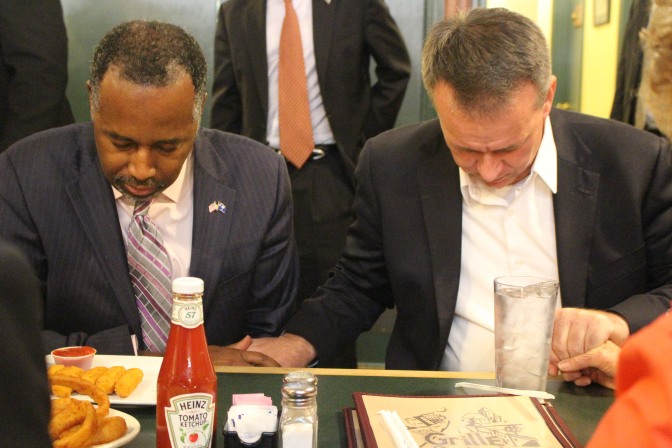 Ben Carson & Rick Martin return thanks for the day's meal.